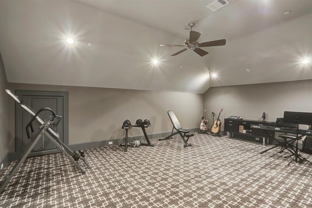 Large multi- purpose room with attic access