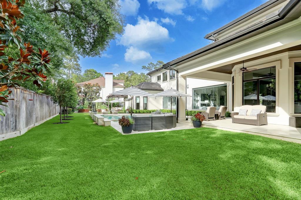 Sweeping yard with fabulous amenities