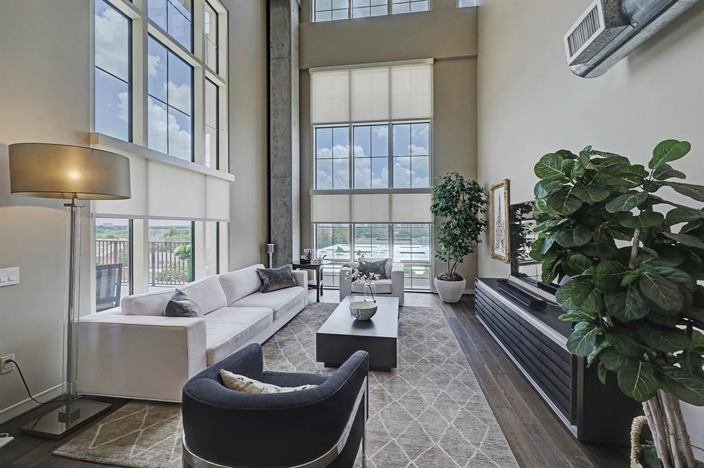 Magazine ready! Living room with incredible 35 ft Ceilings. Amazing views.