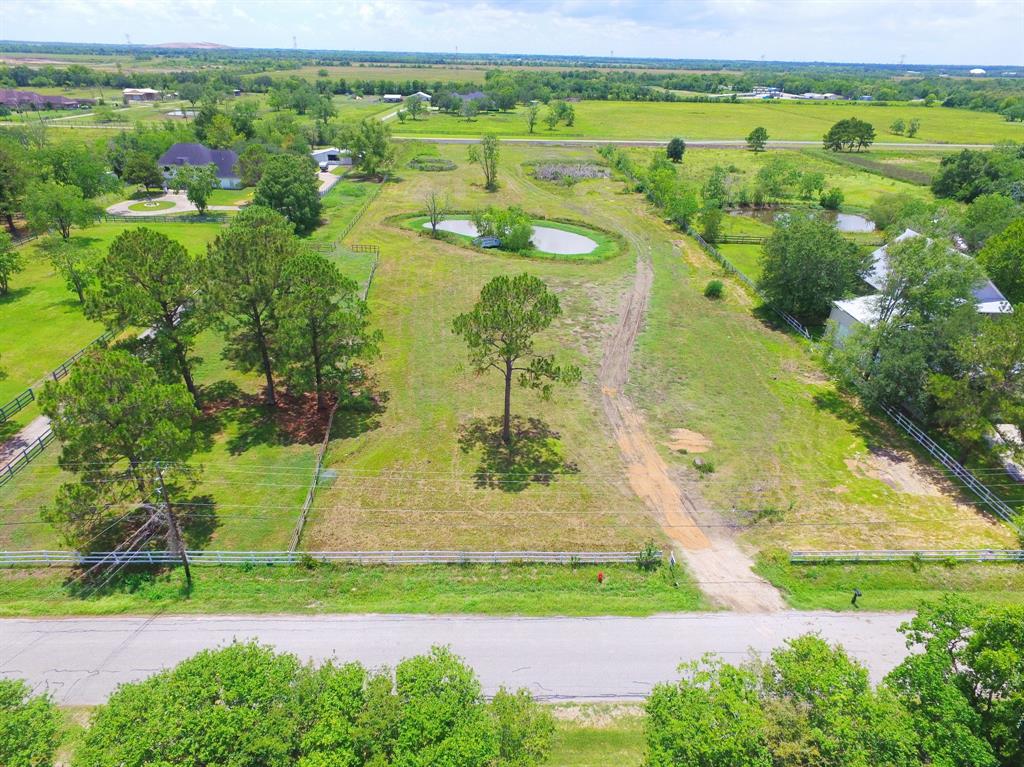 BEAUTIFUL 5.27 ACRE FARM & RANCH LOT IN THE QUIET VAN PELTS SUBDIVISION, FRIENDSWOOD. THIS LOT WELCOMES YOUR DREAM HOME. IF YOU ENJOY LIVING IN THE COUNTRY BUT DO NOT WANT TO BE TOO FAR FROM THE CITY, THIS LOT IS FOR YOU. SPACIOUS LOT COMES WITH PRIVATE POND, AND MANY MATURE TREES. ACCESS THE PROPERTY FROM LUNDY LANE, OR SCHULTE LANE. PROPERTY IS IDEAL FOR HORSES AND OTHER LIVESTOCK. WATER & ELECTRIC AVAILABLE. BARN NOT INCLUDED. PROPERTY LIKE THIS DOES NOT COME VERY OFTEN IN CITY OF FRIENDSWOOD.