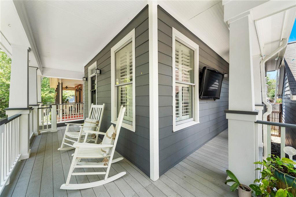 Back outside to your wrap around porch with two access doors, perfect for entertaining.