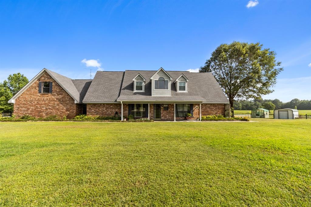 9440 E Fm 321 Palestine, Texas Welcome to the ultimate recreational ranch comprised of over 117.778 acres with a winning combination of pasture & woods, a 12 acre spring fed lake & a two story custom built home with shop! Floor plan encompasses a large living area, kitchen/dining combo, raised high ceilings and with 4 spacious bedrooms, 2.5 bathrooms & an upstairs flex room that could be a 5th bedroom you have plenty of room for relaxation and play! Upstairs you’ll also find two bedrooms & one bathroom. Outdoor space includes a heated & cooled section of the 2700sqft shop w/4 overhead doors, French drains & Generac Generator! Come experience true country living with abundant hunting, fishing and privacy in your own backyard. East Texas at its finest! Don’t Miss!