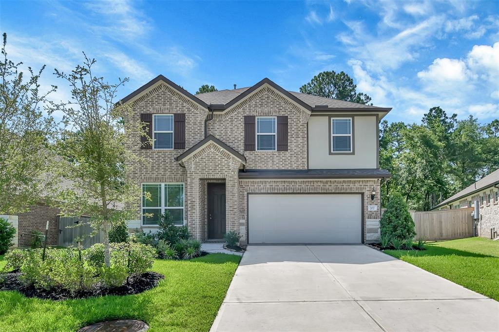 202 Speckled Woods Place, Conroe, TX 77318