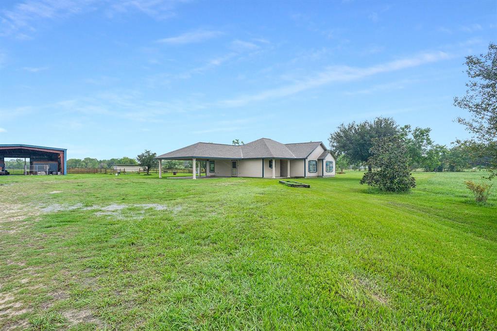 COUNTRY LIVING WITH ALL THE CONVENIENCES OF CITY LIVING.   THIS 10 ACRESS PROPERTY WITH 175 FT OF ROAD FRONTAGE IS JUST A FEW MILES OUTSIDE THE CITY LIMITS OF ALVIN WITH EASY ACCESS TO HWY 35 BYPASS OR HWY 6 AND SHOPPING.  NOT ONLY DO YOU HAVE 10 ACRES BUT A 1910 SQ FT HOME FEATURING 3 BEDROOMS AND 2 BATHS, WALK-IN CLOSETS, AND LOFTED CEILINGS.   

THE PROPOERTY NOT ONLY HAS A BEAUTIFUL HOME FOR THE FAMILY BUT INCLUDES A 42’ X 64’STEEL FRAMED BARN WHICH HAS 3 WOOD LINED HORSE STALLS EACH WITH A 14’ X 14’ FENCED RUNS.  ADDITIONALLY, THE BARN HAS A FEED AND A SEPARATE TOOL ROOM PLUS 42 X 36 OPEN AREA WITH A CONCRETE FLOOR.  PLUS, THERE IS A 20’ X 40’ LOADING SHED MADE WITH GALVENIZED METAL POLES AND A CATCH PEN.  THIS IS AN AGRICULTURE TAX EXEMPT PROPERTY.  

PROPERTY HAS NEVER FLOODED BUT DOES HAVE A GRANDFATHER FLOOD POLICY AVAILABLE FOR TRANSFER.  
JUST THINK THIS BEAUTIFUL HOME WITH CITY CONVENIENCE AND A PLACE FOR YOUR BELOVED ANIMALS.