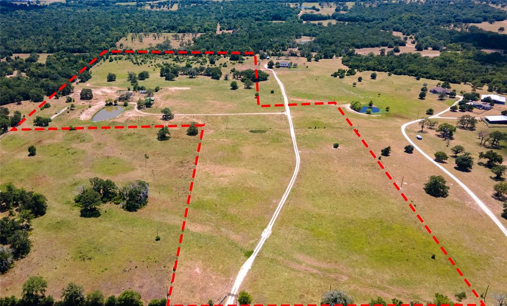 41.1 acre property with endless possibilities! Perfect for cattle, recreation, or to build your dream home. Currently home to two 1,100 sq ft barns and a silo. This property has road frontage, water well, and power. Great pond and beautiful trees line this Ag exempt acreage. Very peaceful and full of wildlife. Don't miss out on your chance to own some prime country property at 18732 Fm 974 Bryan, TX 77808.
