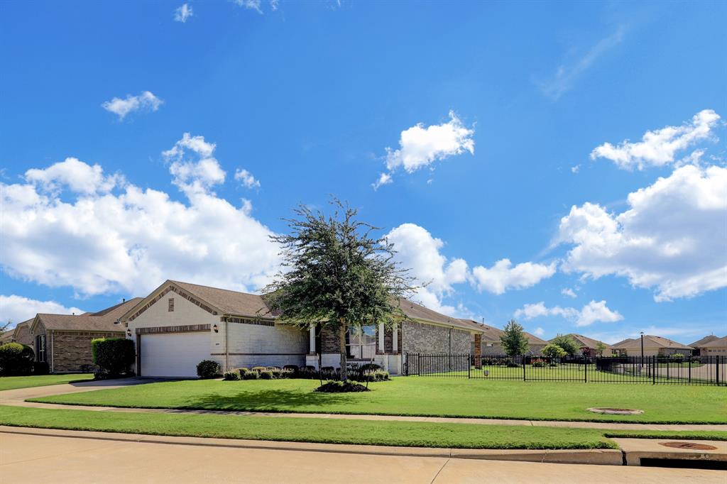 Welcome! To this oversized corner lot in the Sweetgrass Del Webb community. This home is ideal for those that want a peaceful neighborhood.