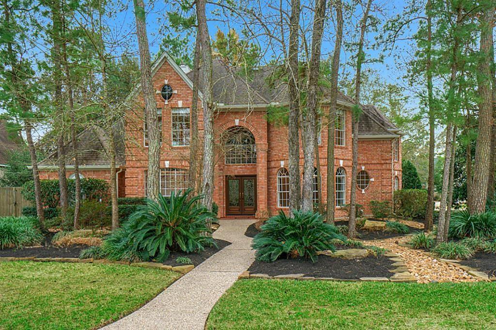 Immaculate Cochrans Crossing custom home walking distance to Galatas Elementary, The Woodlands Palmer Course (General) and Palmer Club House. Beautifully landscaped cul-de-sac homesite with mature trees. Upon entry through the property's double doors you'll immediately appreciate the custom features including solid hardwood flooring and impressive custom mill-work throughout. Beyond the study and dining room is a very impressive/elegant 2-story formal living area with gaslog fireplace and hardwood staircase. The island kitchen features upgraded KitchenAid appliances,freshly painted cabinets and is open to the large family room. The Master bedroom with high cathedral ceiling is down along with an elegant master bath with his/her closets & BainUltra jetted tub. Game room up along with 4 additional bedrooms.16 SEER HVAC systems.Private backyard oasis w/saltwater, Pebble Tec pool and stamped concrete decking.