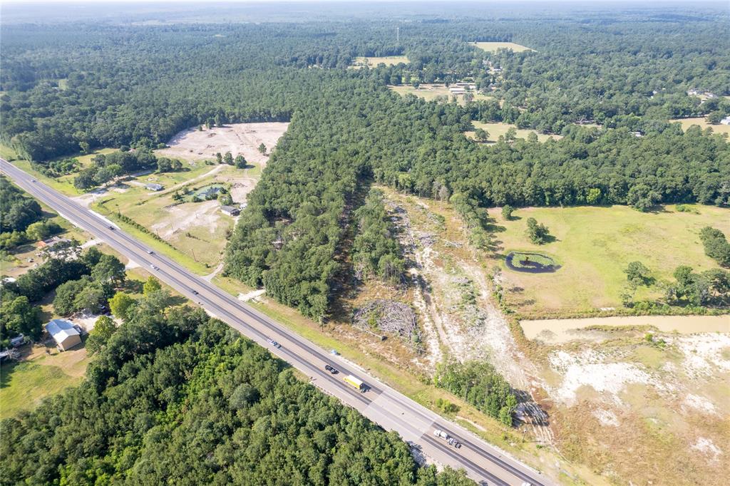 FOR SALE 10.39 ACRE TRACT. COMMERCIAL PROPERTY WITH APPROXIMATELY 439(+/-) SQFT OF FRONTAGE WITH GREAT TRAFFIC FLOW ON HIGHWAY 321. THIS PROPERTY IS APPROXIMATELY 4 MILES EAST OF I-69, ABOUT 19 MILES FROM VALLEY RANCH. HOUSTON AND IAH BUSH AIRPORT ARE WITHIN DRIVING DISCTANCE.