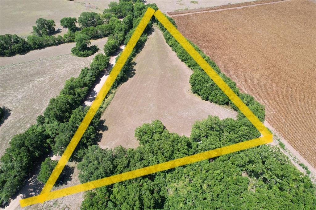 Fantastic find! 6 acres with no known restrictions! In the community of Egypt - ess than 15 minutes to the Wharton Buccees. The property is almost at the end of the county road so very little traffic. The perimeter is lined with huge mature pecan trees providing privacy. Bonus grape vines in several places along the fence. There are 2 perimeter fences, one on either side of the trees. Put cattle or horses on the land without having to worry about them damaging the trees! Improved grass and has been used for hay. Hunting is allowed but with a tract this small one would need to be extremely careful so the bullet does not cross the property line. Property is completely in a flood plain. Wharton County has guidelines in place for structures built in a flood zone. If you have been looking for a beautiful piece of land take a look at this one. No neighbors in sight! Enjoy the evenings listening to the animals and watching the stars!
