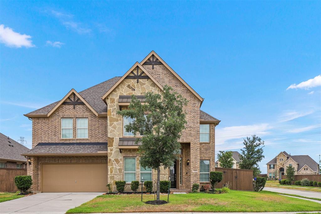 7702 Windhill Drive Spring, Texas Stunning 2-story home in the desirable community of Laurel Park! Well appointed with soaring ceilings, wood flooring, and architectural details throughout. Welcoming foyer with a grand staircase flanked by a private study and formal dining room. A huge island kitchen overlooks the open and bright living room with a wall of windows and a warm fireplace. Serenity awaits in the main level Primary suite with an ensuite spa bath showcasing double vanity, soaking tub, a huge walk-in shower, and walk-in closet. 3 Spacious bedrooms, a huge game room and 2 full bathrooms are located upstairs. Relax or entertain with the spacious covered patio overlooking the texas sized backyard. Great community amenities and convenient location.