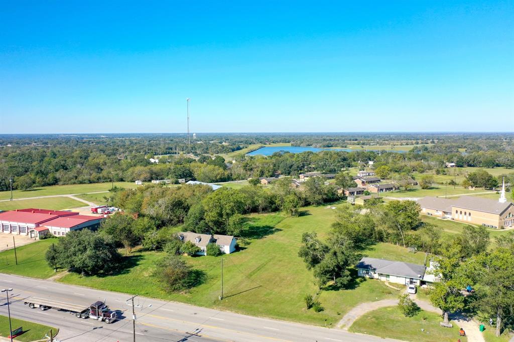 2 Adjoining Commercial Lots situated in a Prime Location in Madisonville City Limits featuring a Shovel-ready development site. Totaling 1.5 + Acres, these lots offer excellent visibility to the high number of daily drivers that utilize Main St., also known as Highway 21/ 190 E. Across from a name brand retail outlet, this property is Strategically located nears schools, shopping, medical facilities, restaurants, and minutes from I-45, the Houston-Dallas Corridor. City of Madisonville Zoning applies; buyer to verify their intended use with the city.