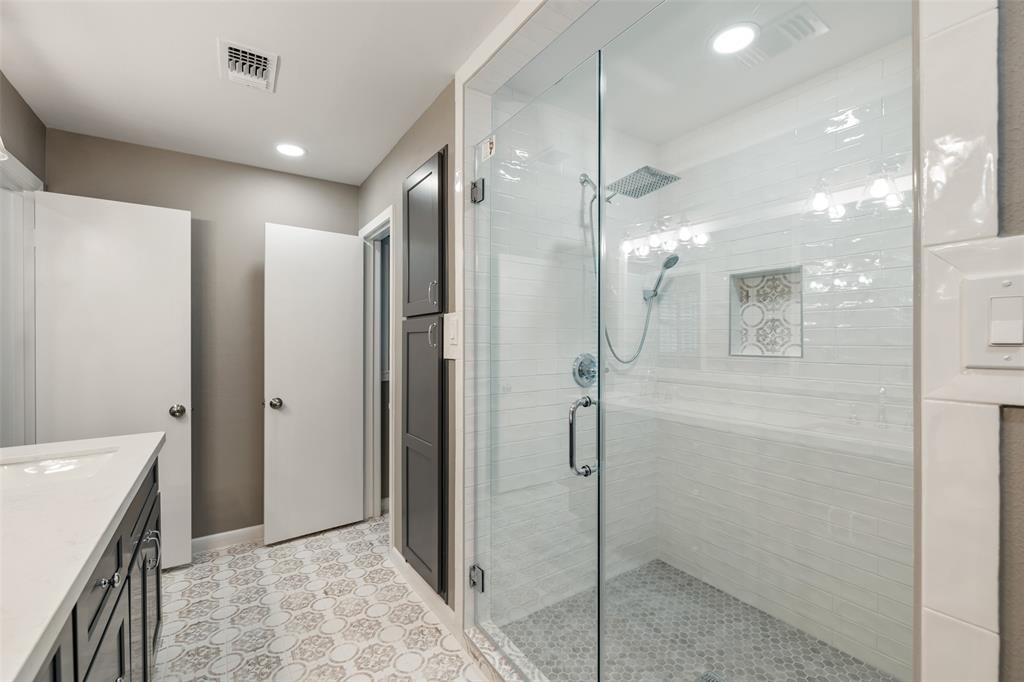 You'll love starting your day in this luxurious primary bath.