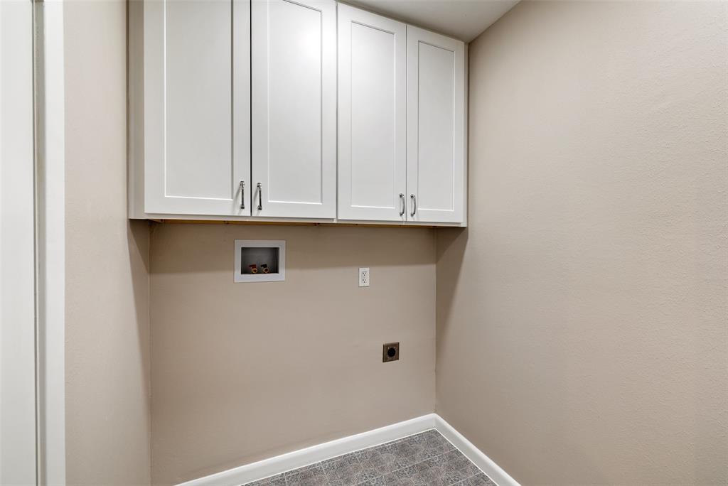 Another update to this home is the addition of an interior laundry room with storage.