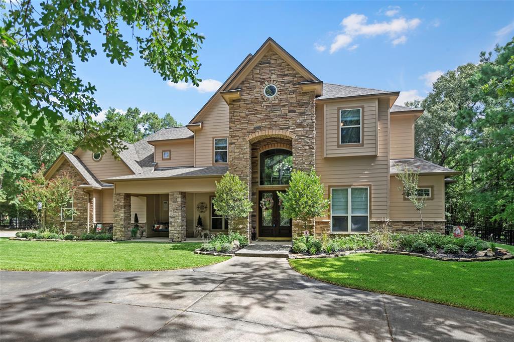 Gorgeous custom home on 2.4 acres, nestled in the heart of High Meadow Ranch in  Magnolia's favorite equestrian/acreage/golf course community. This fabulous home includes many upgrades: roof (2019),  remodeled primary bath (2022), remodeled inground pool/spa (2022) and outdoor kitchen (2022), just to name a few.  As you enter the double front doors into the large bright and airy entrance, you will view a beautiful curved staircase, soaring ceilings and a large private office. The gourmet kitchen has a walk-in pantry, lots of cabinets with above and below lighting.  The kitchen opens into a large family room with custom built-ins and stone gas fireplace. The spacious primary retreat has coffered ceilings, newly remodeled bath with separate large his and her closets. A large secondary bedroom downstairs is great for guest. A movie room complete with wet bar and eight movie chairs. You will enjoy relaxing in the pool/spa(includes a life saver fence), outdoor kitchen, fire ring and garden.