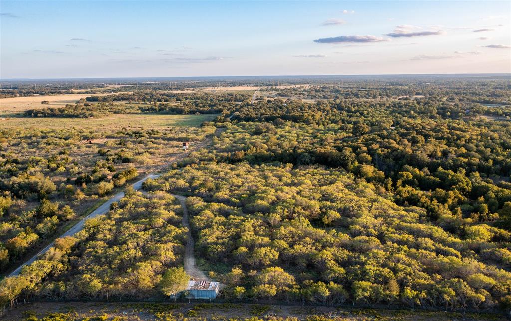 If you are looking for a recreational property in a country setting, look no further! This 25+ acre property has a water source, seasonal creek, existing trails, & an abundance of trees and wildlife.