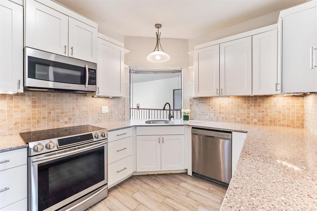 Renovated kitchen with all of the modern touches and stainless steel appliances.