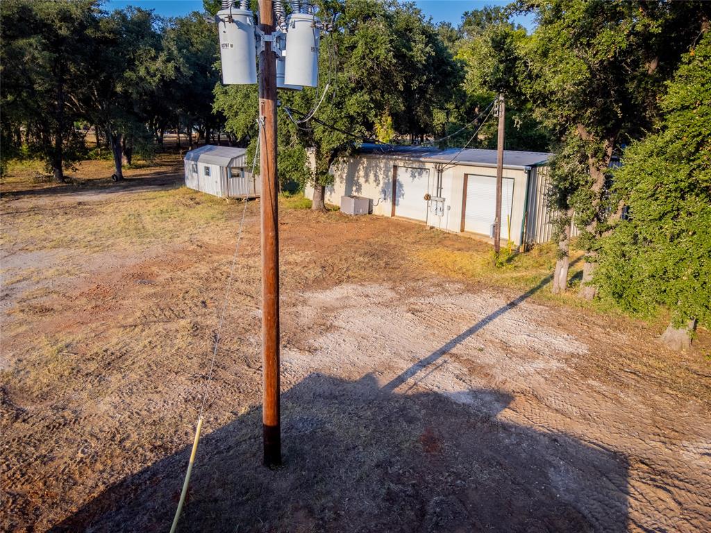 Must see this 5 acres 12 miles outside of Caldwell city limits. 2000 sf workshop towards the front of the property with room to build on the remaining acreage. 3 phase power supply, septic in place, 2 RV hookups, Not in the flood zone.