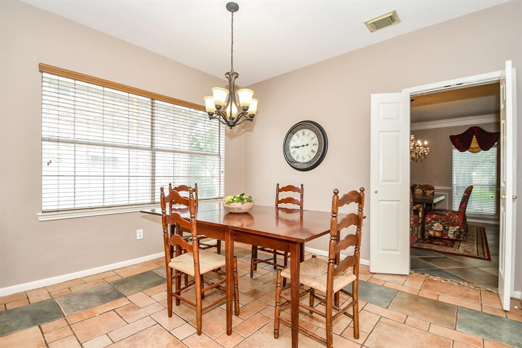 This cozy, naturally lit area, is perfect as a lovely breakfast/casual dining nook.