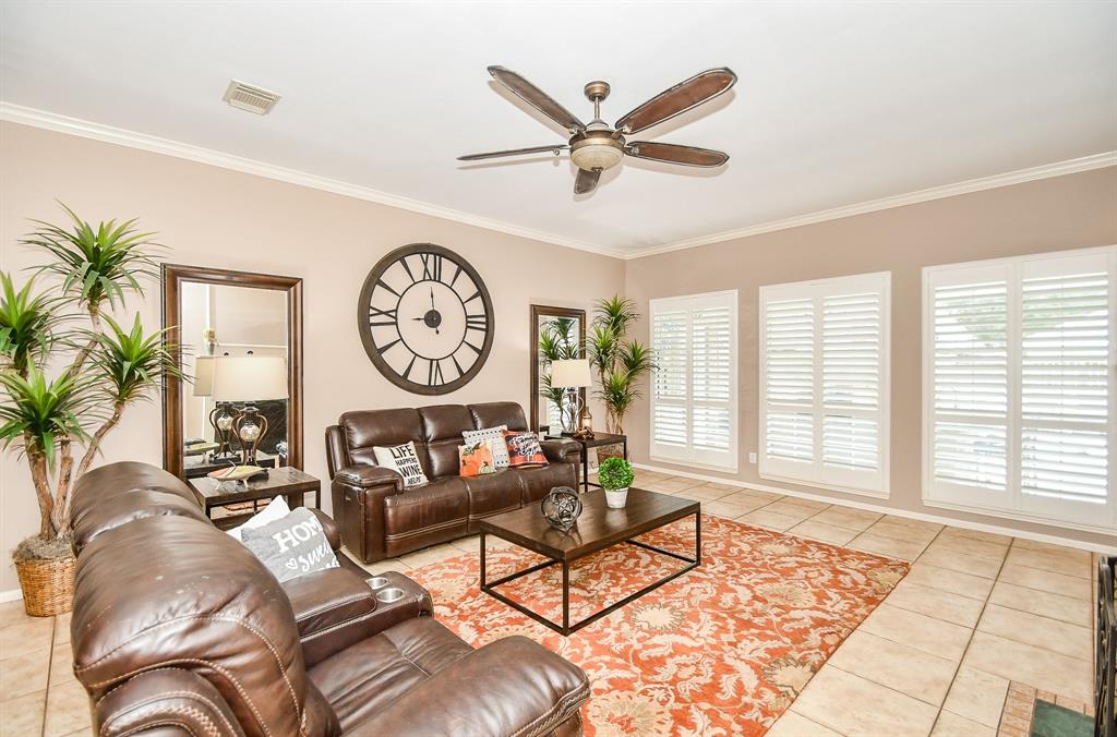Tremendous floor-to-ceiling windows bathe your beautiful living area in bright sunshine and in the dusky skies of night.