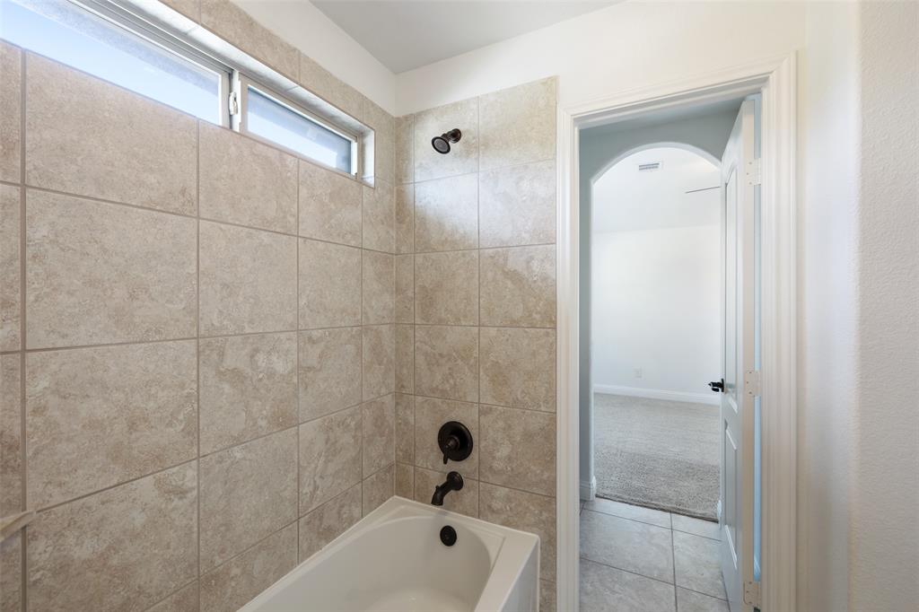 With bathtub/ shower combo.