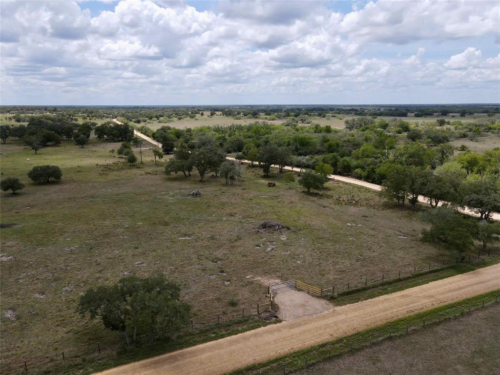 5.8 acres with wonderful oak trees, great building sites, a new entrance and improved pasture! Electricity nearby. The property also has an old shed that could be fixed up into a storage barn. Tracts of land this size do not come for sale very often in Lavaca County.  Very light restrictions in place to protect your investment. This property is located just 7 miles southwest of Hallettsville near Sweet Home, just a short hour and a half drive from the Houston suburbs, 2 hours from Downtown Austin, and an hour 45-minute drive from San Antonio. Come build your dream home, or purchase now for a weekend getaway!