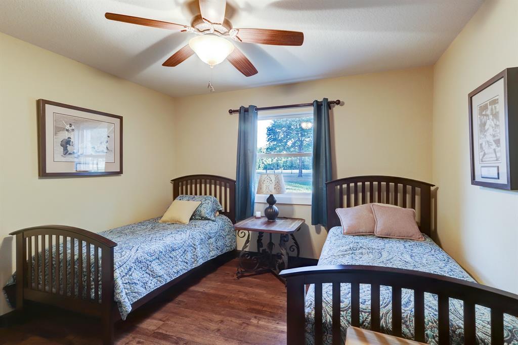 The second spacious bedroom located in the private suite off of the mainlining area. It also has a large walk-in closet.
