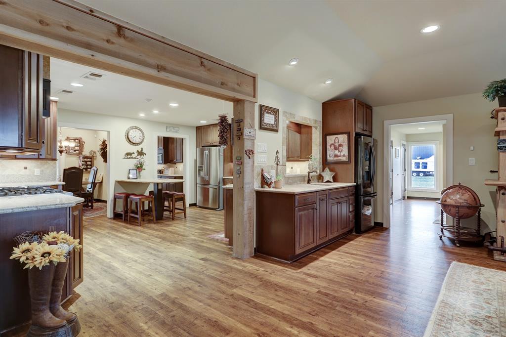 View of the entry to the gourmet kitchen from the secondary living area.