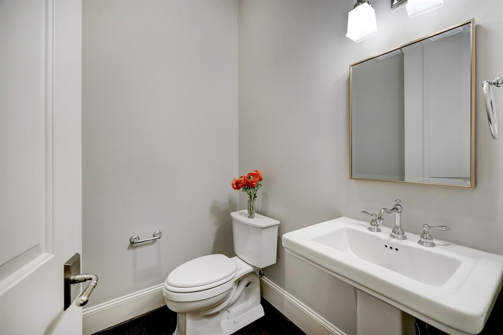 Powder room off living area on second level.