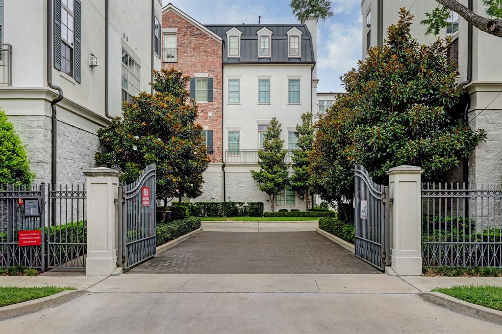 Entry gates to the common area and driveway to the garage.
