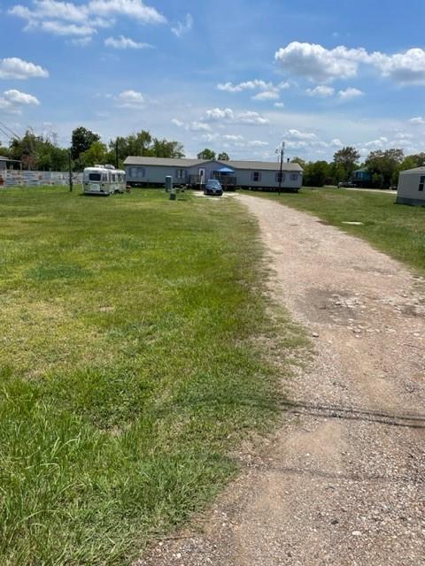 This listing includes Mobile home 2809 sq footage(0170 M ESCALERO, MH ACCT ON LAND #000-0300 & 0170 M ESCSLERO, ACRES 1, WEST HALF). 2 acres and mobile home in total sale. Home has his and hers toilet in master bedroom. PROPERTY IS LOCATED IN PERFECT LOCATION. SOLD AS IS. Bring your best offer.