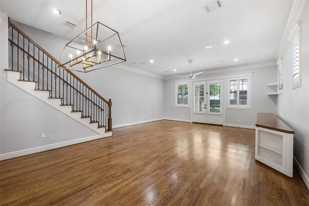 Per the seller, this home is smart home ready. It includes Phillips Hue lights throughout and a Ring security system. The living room also includes a custom fan, chandelier, recessed lighting and speakers, and crown molding.