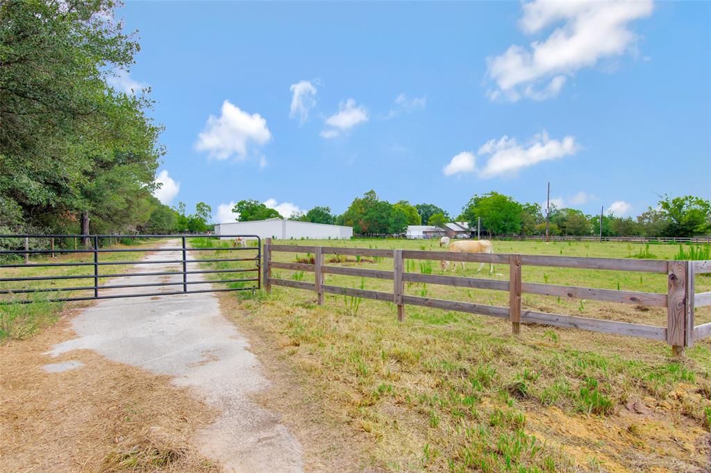 This adjoining unrestricted ( 2 ) 10 acre tracts totals about 20 + - acres offering aprox. 540 feet of Mueschke frontage , is between fm 2920 and 99 . There are multiple structures on the property . A 1 story ranch house with a pool . 1 ) A warehouse totaling approx. 5000 sq.ft. 2 ) A 2ND. building totaling about 2500 SQ. FT. 3 ) A 3 RD . Building totaling about 900 SQ. Ft. with a kitchenette and full bath. Each tract has its own well and septic. The property would be great for commercial development or a home based business . Both adjoining tracts make a perfect rectangle , roughly 1600 FT. deep on both sides and roughly 540 ft. in width front and back. NOT IN THE FLOOD PLAIN .High and dry. The county is currently finishing the widening to 4 lanes on Mueschke in front of the subject , and is on its final stretch , approx. 1 mile left to go before completion. 4 LANES BETWEEN 290 and 2920 running north and south. BOOMING AREA !!!