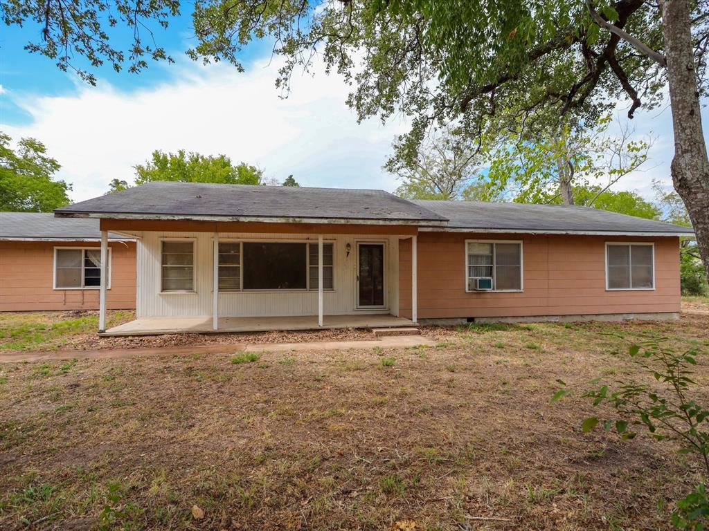 This 1960 ranch-style home on 20.43 acres is what you're looking for! Located approximately 3 miles West of Hallettsville, this 4-bedrooms, 2-bath house is a real find. The living area along with open-concept dining and kitchen space welcomes the imagination of what this home can be. Off the back of the home find an attached two-car garage or workshop. The property is loaded with mature oak trees throughout and a cleared pasture in the rear, making for an ideal setting for the buyer wanting to raise cattle or horses. Call for your personal tour of this great property!