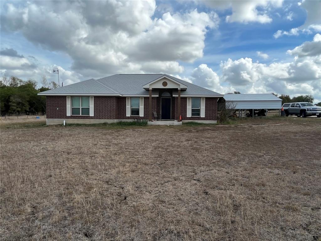 Looking for land, looking for a great home away from the hustle and bustle of the city.  This is it! 11.5 Acres of non restricted wide open space with a 3/2/2 carport.  Approx. 30-40 minutes from new Tesla plant and the coming Movie Studio.  Only brick home on Pettytown Rd.  Make this beautiful property your home or home away from home. Agents bring your preapproved buyers.