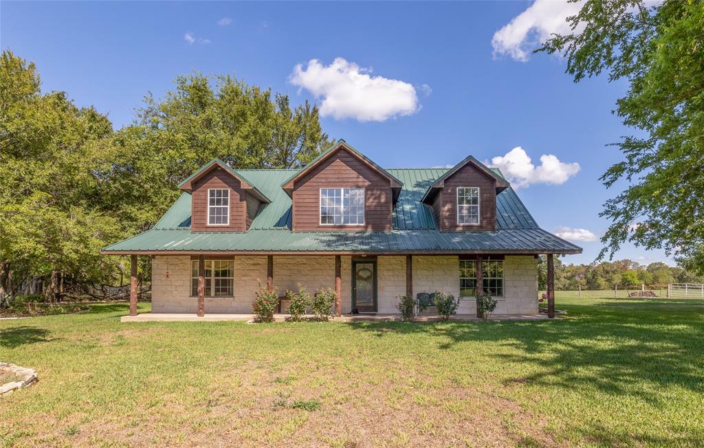 Beautiful one owner home on 33.685 acres in north Brazos county! Located a short 30 minutes from the Bryan-College Station area, this secluded property has a lot of potential. This 3 bed, 2.5 bath home has been meticulously cared for and maintained. The kitchen has ample cabinet storage and spacious counters for cooking or entertaining! The kitchen looks out into the open living area and fireplace. Large windows allow natural light in and have a wonderful view out onto the property. The master bedroom suite is located on the main floor and has a connecting hallway to additional closet space and a study. The study could also be used as an extra bedroom if needed. Two oversized bedrooms upstairs are separated by a landing which overlooks the living area and provides a spectacular view out into the pasture behind the house. Each spacious bedroom has ample closet space and attic access. Come tour this country retreat today!