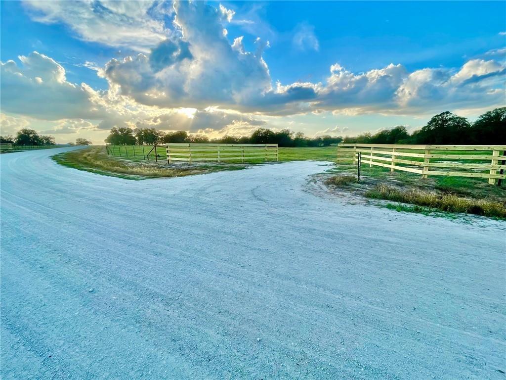 Wait 'until you see this stunning location for your Texas country home! Located in the serene horse and cattle country of Burleson county, this 4.48 +/- acres of unspoiled countryside comes with a mix of improved coastal bermuda pastures, intermixed with mature oak and other species of trees that makes for a remarkable setting for your country home. Quality improvements abound with new five-strand barbed wire fencing on the land's perimeter and a majestic 4-board equestrian fenced entry gate with a 24-foot recessed entry drive along the newly constructed Bria Bend Drive. The land conveys with light restrictions in place to secure the enjoyment of your Texas Country homestead for years to come. A short drive from Caldwell, Brenham, Lake Somerville and the action of SEC Country in Bryan/College Station, the land also resides in a geographic sweet spot of Texas making most of Houston and Austin approx 65 miles away or less.