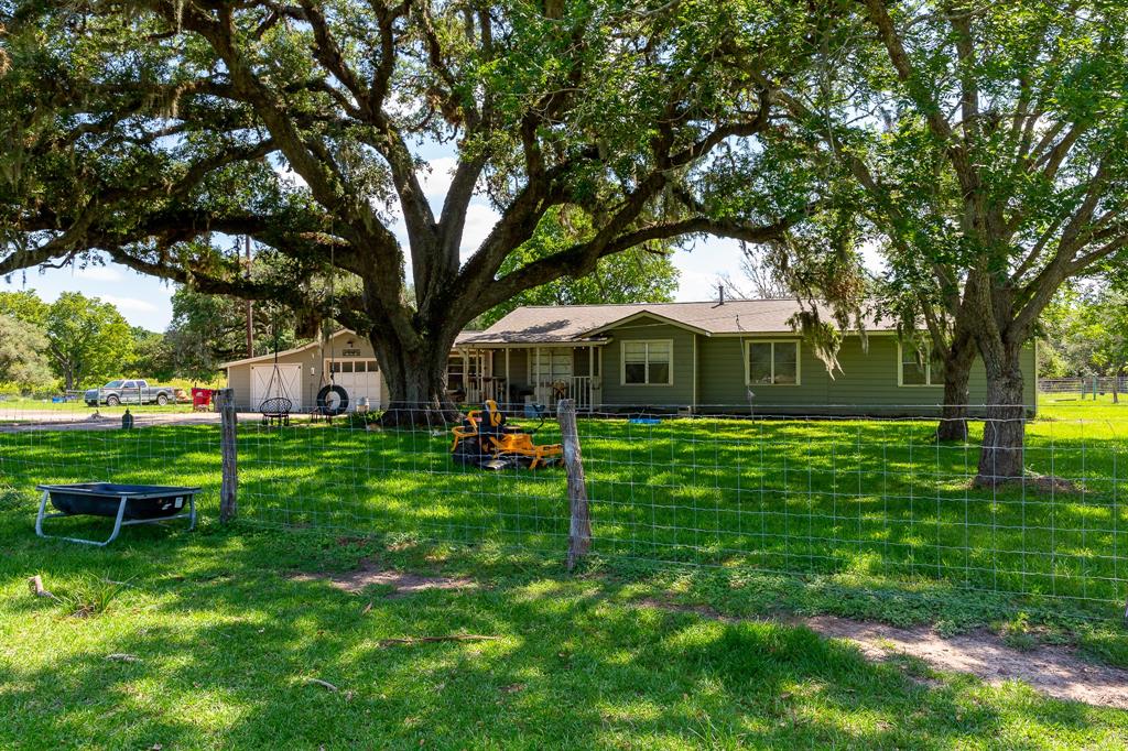 3 Bed 2 Bath Home on 5 acres in Van Vleck!  There are Beautiful Mature Oak Trees on the property, close to town with a country Feel. The Property is fenced and crossed fenced.