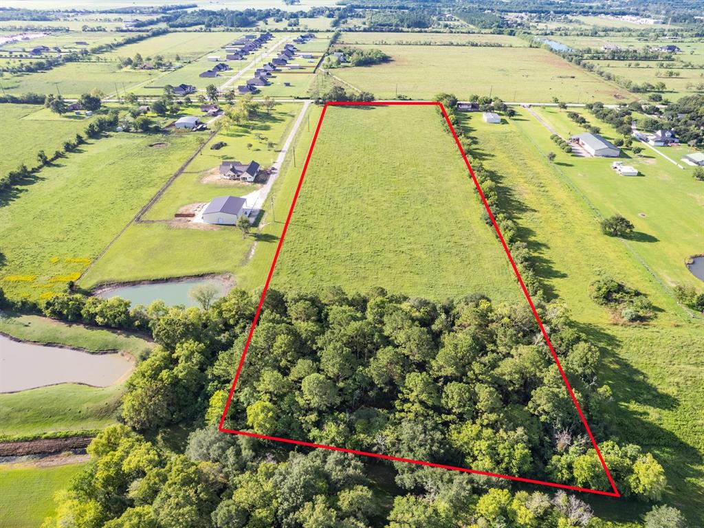 Very Very Rarely a property such as this becomes available.  30 minutes from Downtown and surrounded by Custom Homes in the area is a perfectly shaped 12 Acres.  Stunning setting features Mature Woodline to Enhance the Serene Setting and Promote Seclusion and Privacy.  The possibilities are endless.  Call Today for More Information.