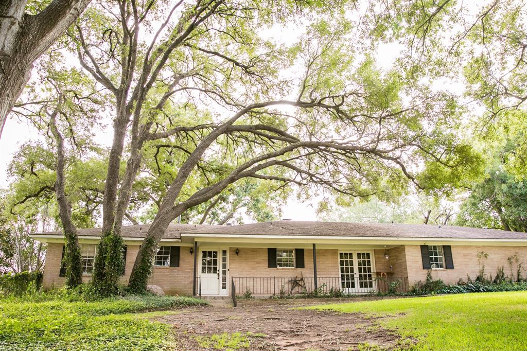 Beautiful landscaped 10 acres in the heart of Brenham in a growing area. Close to schools, Blue Bell Creamery, Blue Bell aquatic center, retirement center and professional offices. Vintage 1970’s classic ranch style 4bd/2ba home with custom features and 2 car carport. Property also includes an office/guesthouse with 1bdrm/1bath, living/kitchen and utility. Zoned B-2 so many possibilities for development. SELLER TO CLEAR THE SITE WHERE THE FORMER GREENHOUSE OPERATION EXISTED. REMAINING BUILDINGS WILL BE THE RESIDENCE, OFFICE AND EQUIPMENT BUILDING. This awesome corner location that is extensively landscaped would make a beautiful shaded green belt area for a multi family, professional office or townhouse development. In close proximity to the major retailers along HWY 290, Walgreens, many hotels and other retailers and restaurants. A short distance to historic downtown Brenham with plenty of fine dining establishments, boutiques, theater and live music venues.
