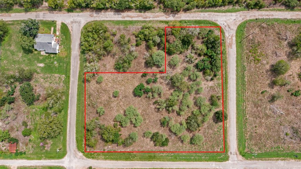 This acreage is made up of 9 tree covered city lots in the City of Altair.  This property is convenient to Hwy 90A and Hwy 71.  Buyer to confirm but mobile homes should be allowed.