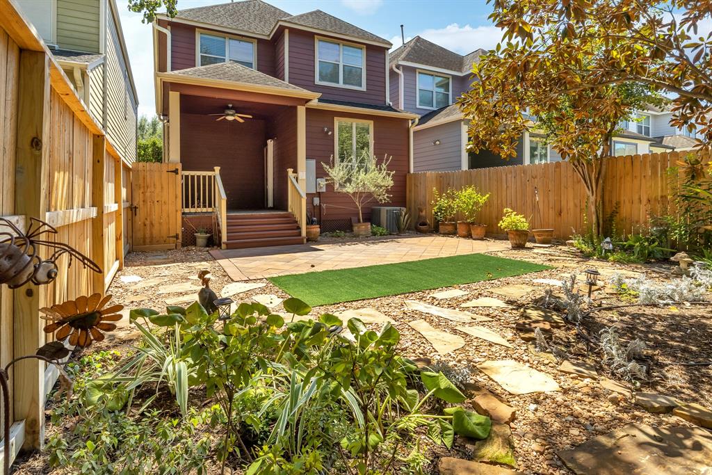 There is no shortage of beautiful landscaping in this home's backyard.