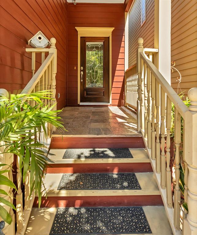 The solid wood and glass front door make this home quite inviting.