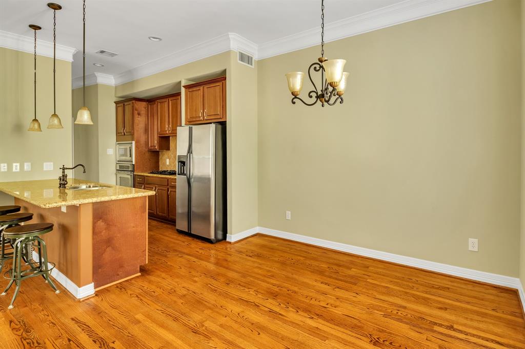 The home has an open floor plan, yet still maintains a separate dining space.