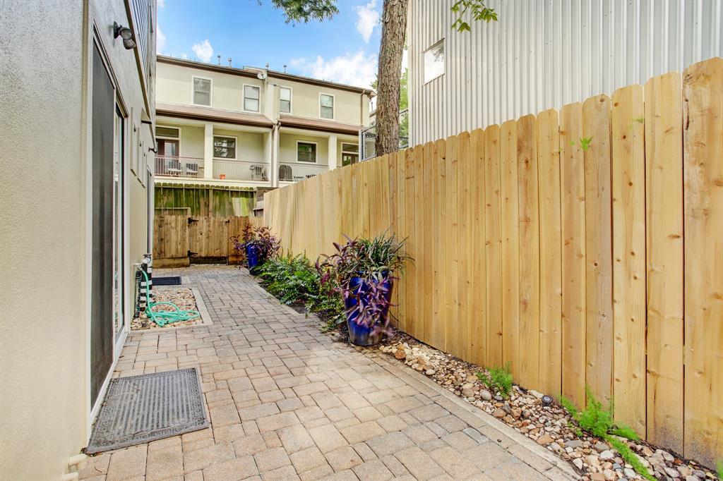 Recently replaced fence line and spacious patio area.
