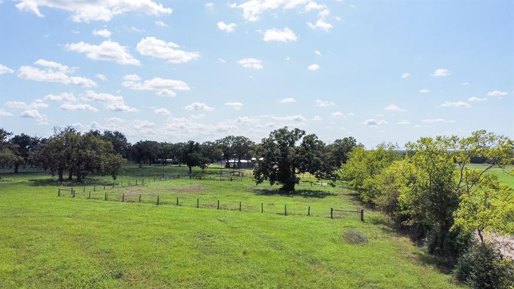 Beautiful pastureland with the perfect spot to build your dream home. Property is fully fenced with large, fenced pen perfect for your equine or livestock needs. Well was put on the property this year and electricity is in the area. With easy access right to the feeder of I-45, this property is in a prime location just 2.5 miles from town and only 100 miles to Houston. Give us a call to come and take a look at this amazing property!