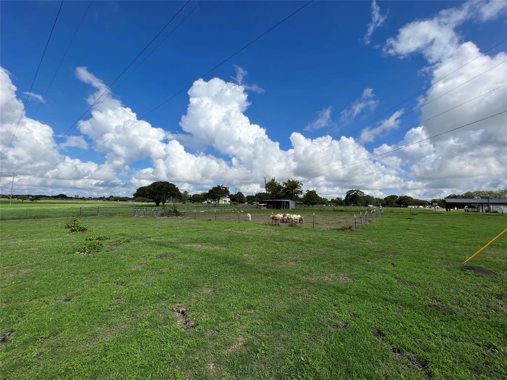 Come see this beautiful 4 acre lot in the heart of a great neighborhood. The lot does have city water and it is inside the city limits of great City of Eagle Lake. You can use this land for livestock or build yourself a home on it. The conex boxes DO NOT come with the property.