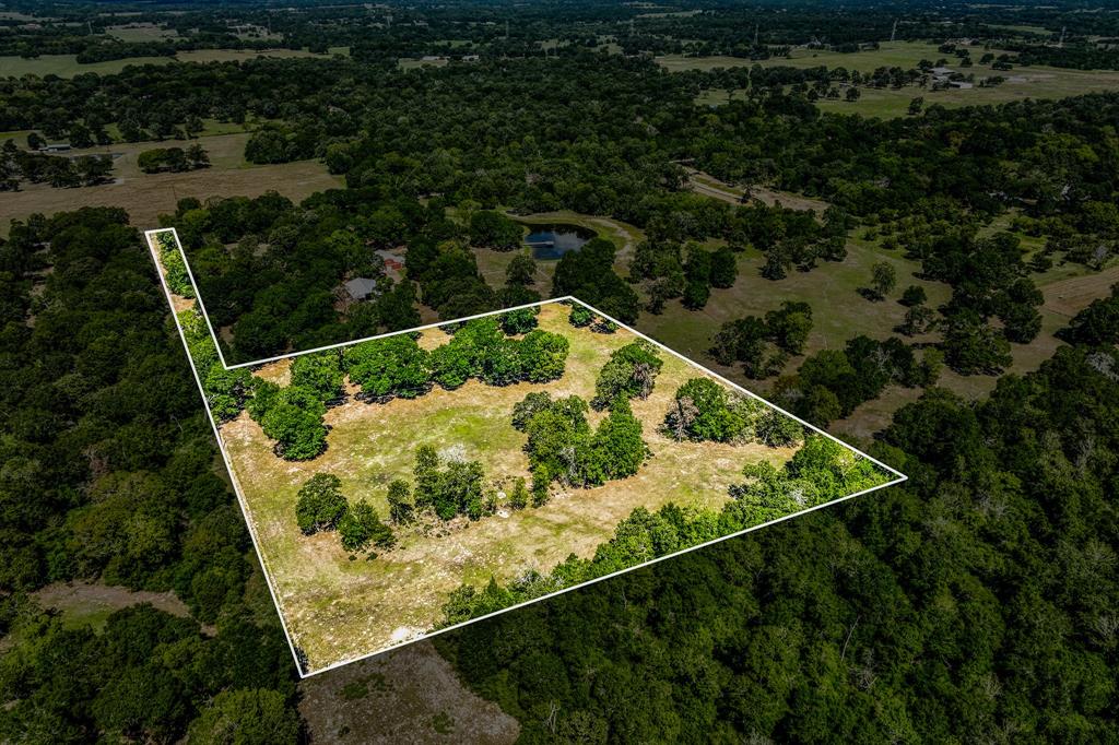 Here is your chance to own 8 beautiful acres within 10 minutes of Brenham. Land has large oak trees as well as many other varieties scattered throughout and is tucked in a beautiful wooded meadow. Deer roam this property consistently. A truly amazing little tract of land ready for your weekend or full time home. Beautiful homesite ready for your builder. These small tracts this close to town are getting harder and harder to find. Call Matt Montgomery for a tour. Land will have minor deed restrictions. Seller is selling 3 total tracts so possibility of adding acreage if desired