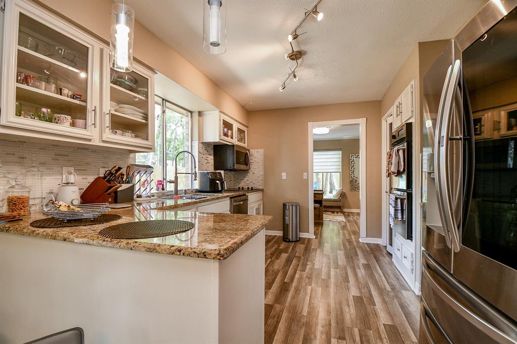 Clear paths to and from the kitchen area make everyday and special day tasks, a breeze. If you choose to make the room ahead a formal dining space, you're just steps away from entertaining in grand style!