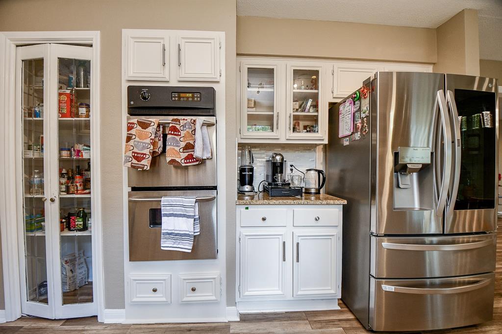 Everything (including the glass front pantry doors) is within clear sight and fingertip reach!