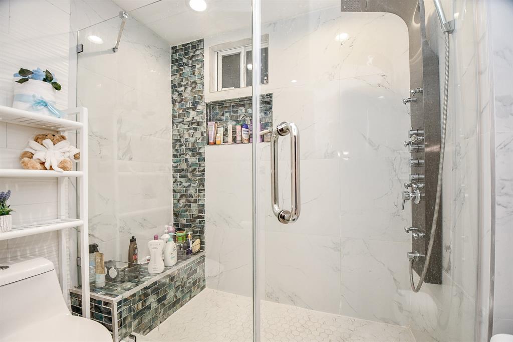 Get comfortable in your new shower with its handy bench!